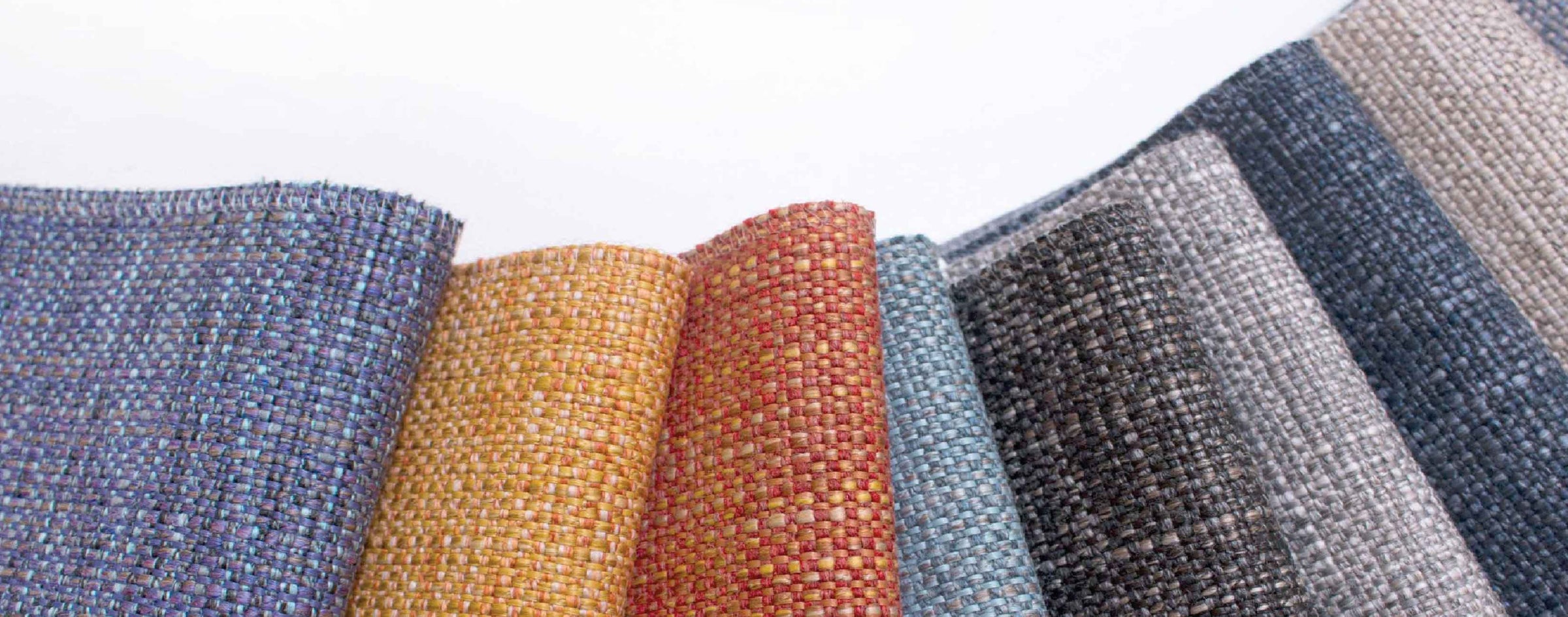 A close-view of supple and high quality recycled textile in a lovely array of colors.